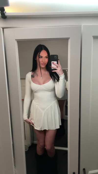 How does it make you feel to know that under my skirt there is a big cock? scared? horny?