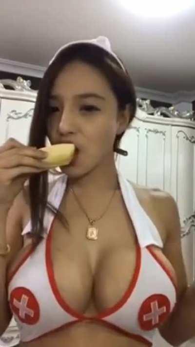 Putting a 🍌 between her melons