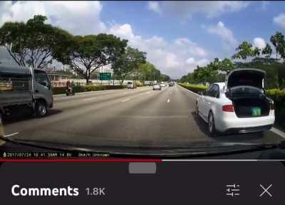 Speeding biker rear ends stopped vehicle in fast lane and flies through the air !