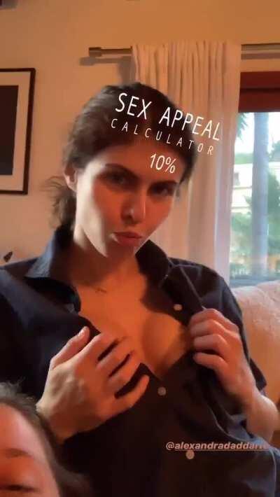 Alexandra Daddario pushes up her big tits, maximizing that cleavage, only for a sex appeal app to disapoint