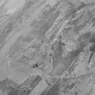 Luftwaffe Bf 109 lands several cannon hits on a Soviet fighter over the Eastern Front in early 1943