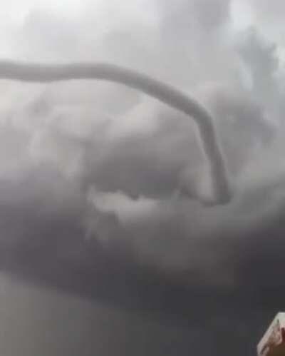 Guy realizes he's about experience a tornado first hand