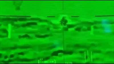 An anti-tank missile launched from M2A2 Bradley collides with a bird