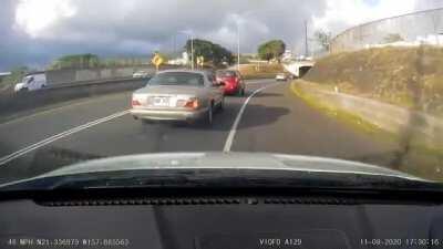 Ran off the road by a Jaguar GRF 937 in Honolulu. Report submitted to police.