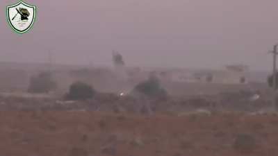 FSA 1st Artillery Regiment fighters suppress Syrian Army positions with technicals & rifle fire - al-Mazraa - 2014