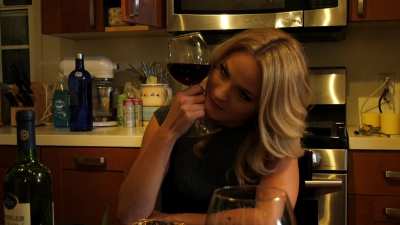 Two best friends get closer over a glass of red wine