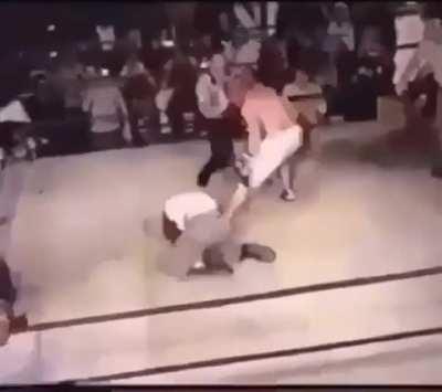 wcgw trying to challenge a referee in a boxing match