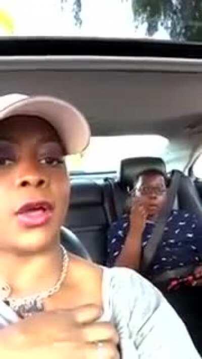 Kid gets caught flipping off his mom