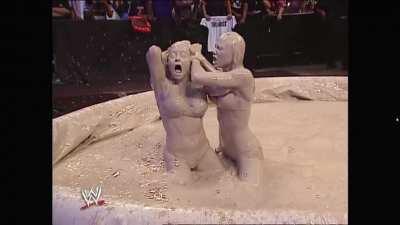 We all knew Trish Stratus was thirsty, but I don't think she likes being dunked in the mud like that!