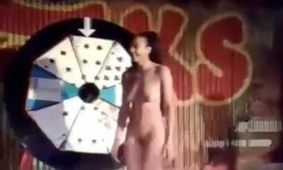 Clearly embarrassed, woman on stage reveals pussy (and ass) to everyone in the crowd