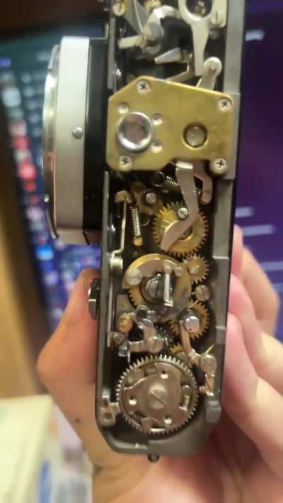 Canon FX shutter release and film advance stuck, mirror staying up.