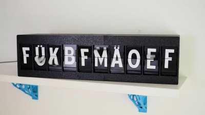 I designed my own split-flap display