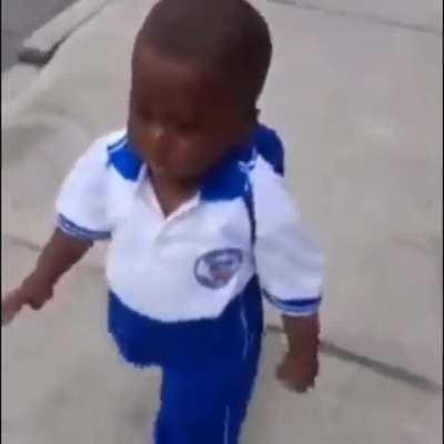 Kanye west walking towards the grammy stage after he lost Aoty to Taylor