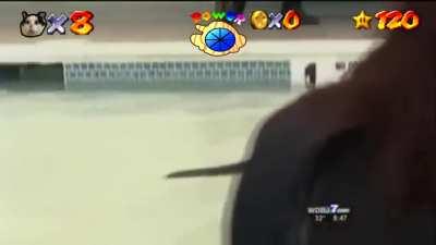 gato nadando con musica de agua super mario 64