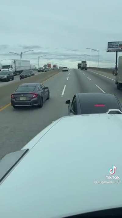 All because they merged into the same lane at the same time. Wife and child in the car too