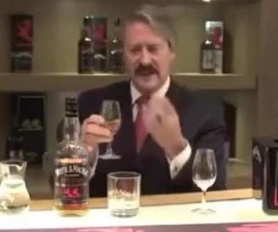Try and take the man seriously. How to drink Whyte & Mackay properly. Apparently. 