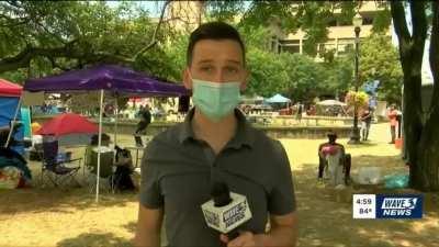 Follow up to the driver attacked by crowd and runs over one of the men. In the follow up newscast one of the men pulls a gun and tries to shoot the driver