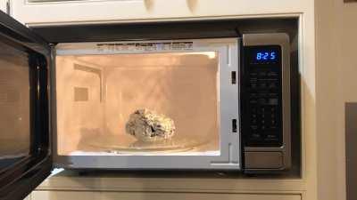 this is what happens to aluminum foil when you put it in the microwave