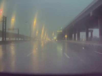 Heavy rain as this car passed me. My car slowed before I saw anything. Bonus points for my car