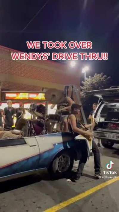 Holding up the line at Wendy's to play music