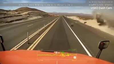 Idiot in Nissan cuts off semi, regrets immediately.