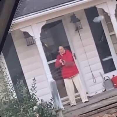 Woman points gun at Amazon delivery driver