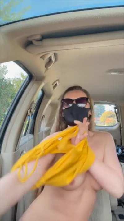 Changing my dress in the car, but giving the neighbors a little show too 😇 [GIF]