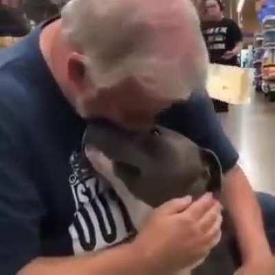 A man and his newly adopted dog.