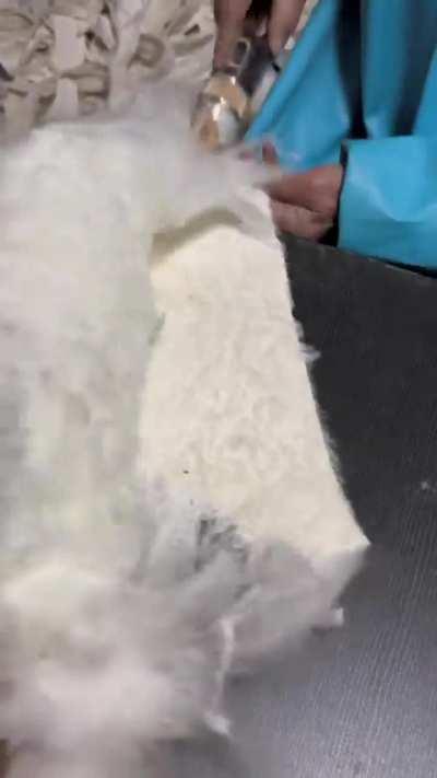 The process of turning sheep's wool into a luxurious blanket