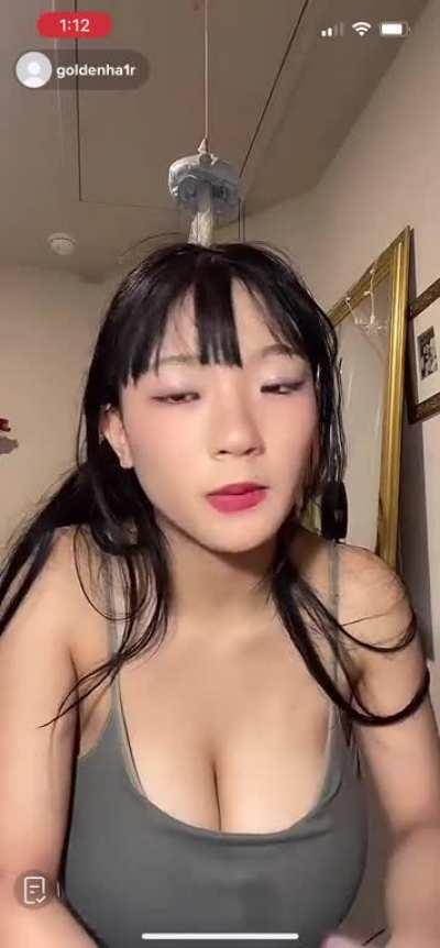 Low hanging tits Asian