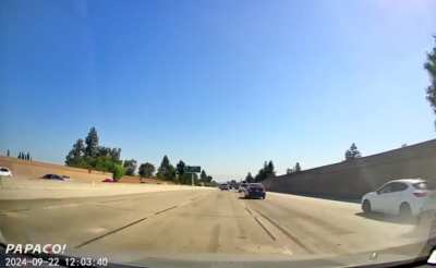 white Mazda blindly turned left 