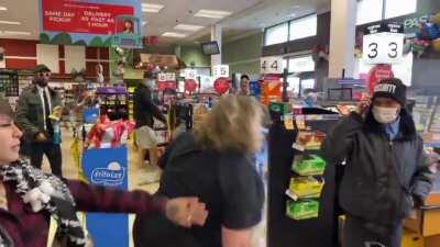 Anti mask mob invades a grocery store.