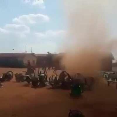 Dust devil vs plastic chairs