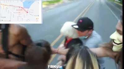 Old EGR Lady brings a bat to the protest