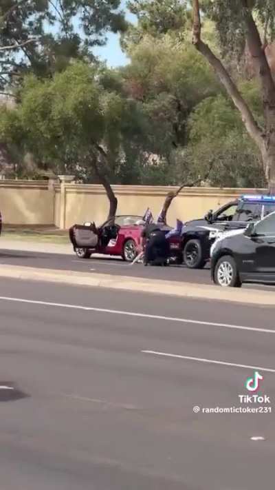 Trump Supporter Freaks Out & Pulls Flag on Cop During Traffic Stop