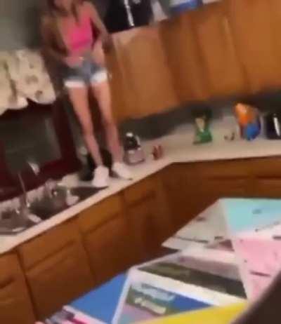 Elbow drop from the kitchen sink onto a table