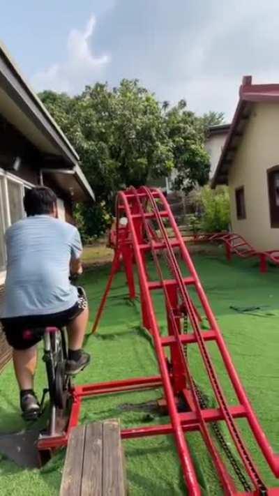 A bicycle powered mini roller-coaster.