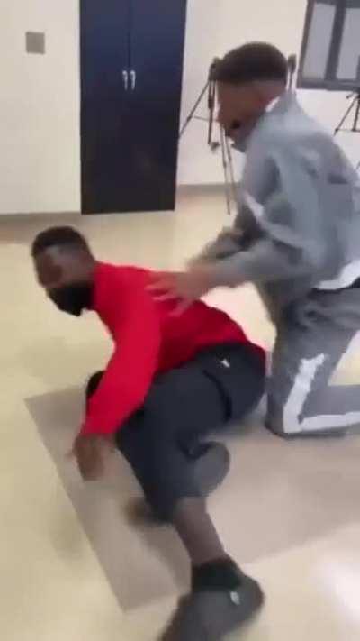 Senior (guy in red) asked a freshman out and guy in grey recorded it which made senior(guy in red) angry and they fought