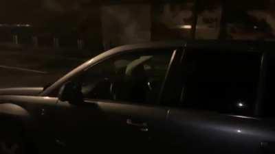 Trying to break into someones car