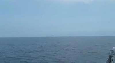 Polish Su-22UM3K doing really low lowpass next to a warship