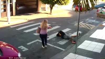 Trying to rob someone in front of elementary school