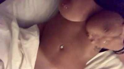 Jiggling her big pierced tits