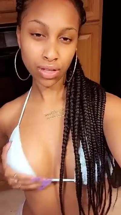 Playing with her tits