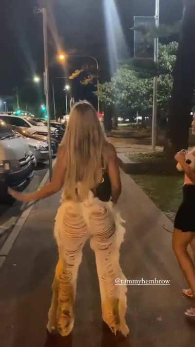 shaking her booty in ripped jeans