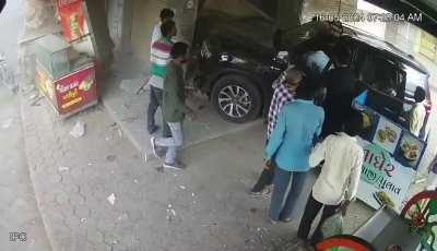 Sleeping Homeless man gets run over by out of control car. India, 16 May 2024