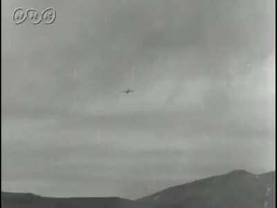 Japanese ships at anchor in the Aleutian Islands are attacked by US B-24 bombers and PBY Catalina flying boats, the Japanese put up a barrage of ship AA fire which scores a direct hit on a PBY Catalina (July 1942)