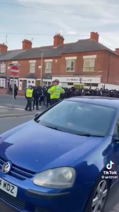 Police in the UK separate groups of Muslims and Hindus angry with each other after the terror attack in India