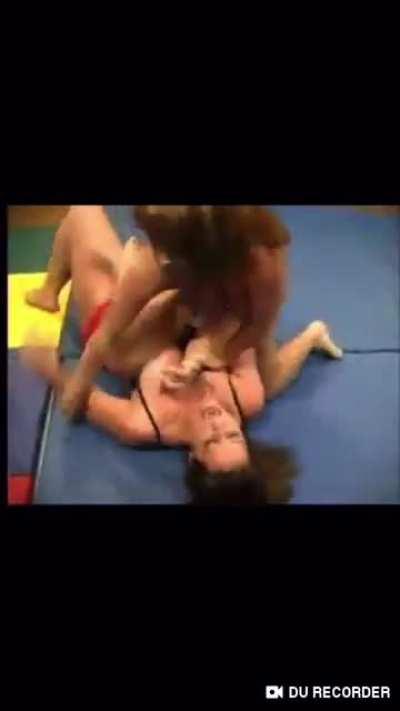 Small girl tries best to put up fight until she is dominated by breasts, sat on and humiliated at the end