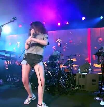 In jean shorts singing Be The One