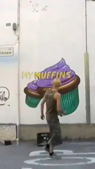 This artist covers up hate symbols with art of Italian delicacies.